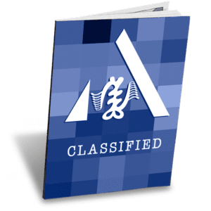 A book with the word classified on it.