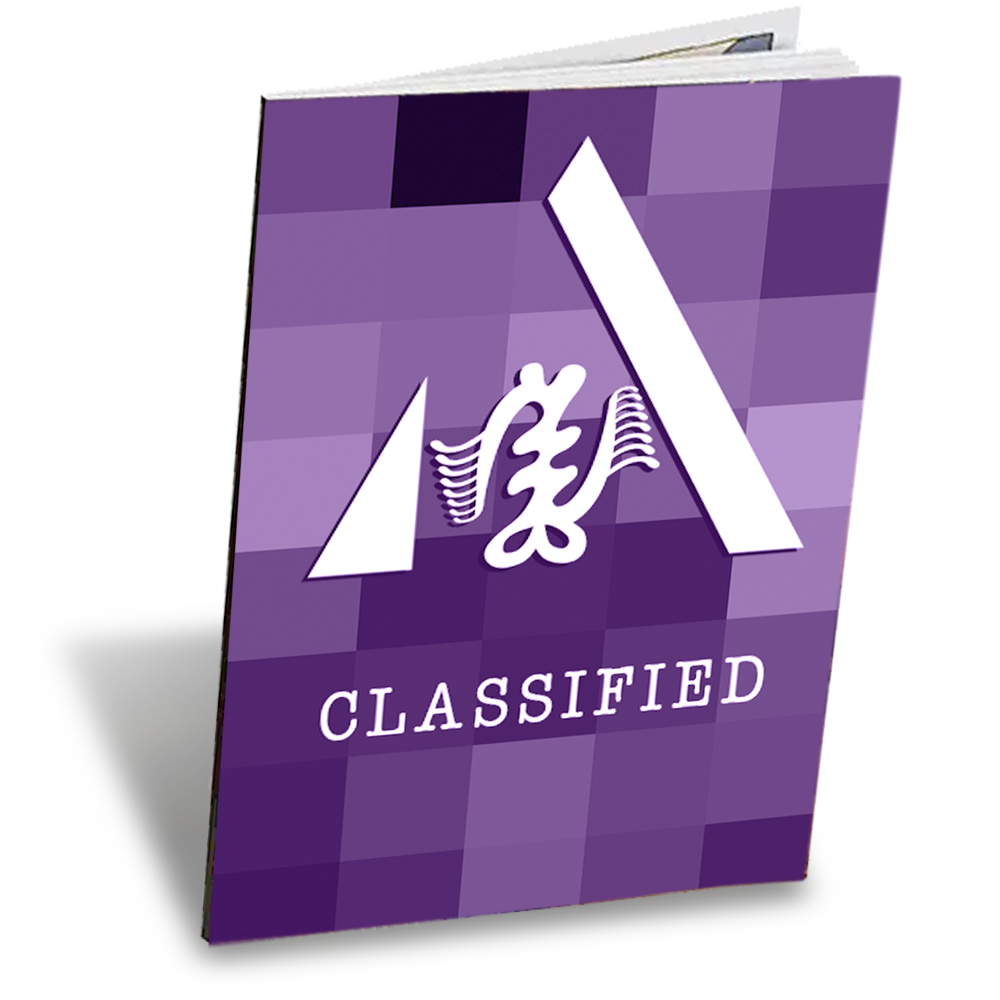 A purple book with the word classified on it.